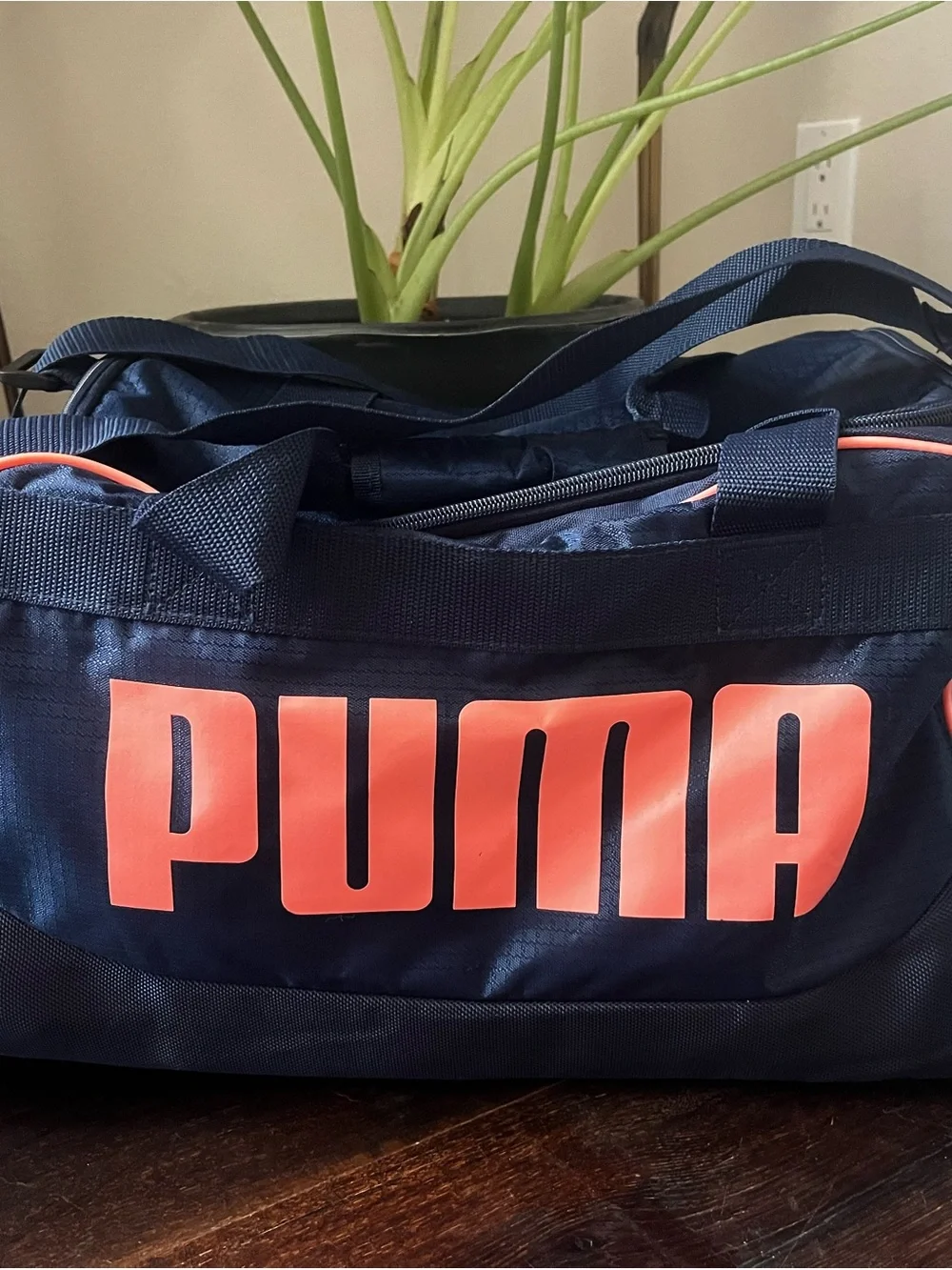 Puma Navy Duffel Bag with Coral Logo Accents